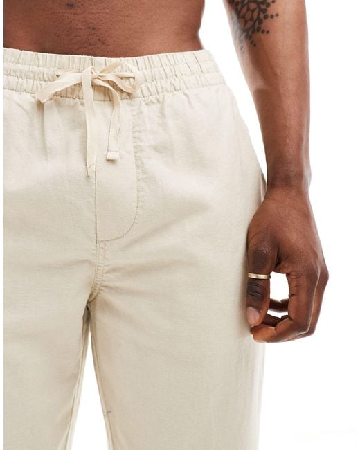 Pantaloni a fondo ampio effetto lino color sabbia di Pull&Bear in Natural da Uomo
