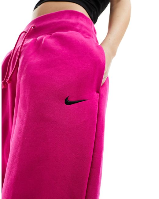 Joggers rosas extragrandes con logo pequeño Nike de color Pink
