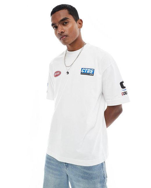 Camiseta blanca con estampado gráfico estilo motocross The Couture Club de hombre de color White