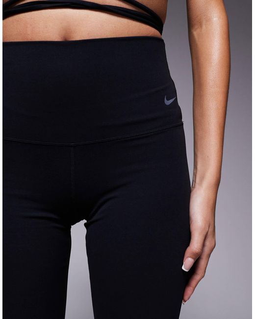 Zenvy - pantalon évasé taille haute en tissu doux dri-fit Nike en coloris Blue