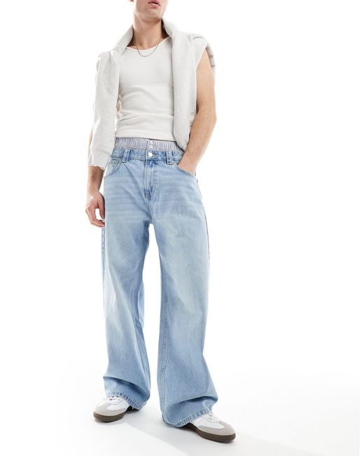 Jeans extra ampi con fascia di Bershka in Blue da Uomo