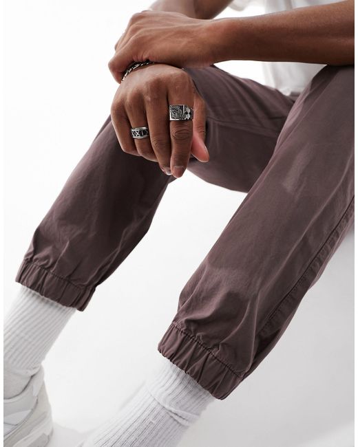 Pantaloni cargo affusolati scuro slavato con vita elasticizzata di ASOS in Brown da Uomo