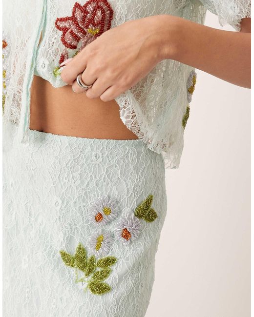 Jupe d'ensemble mi-longue en dentelle avec motifs floraux - clair ARRANGE en coloris Natural