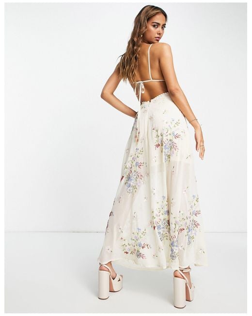 https://cdna.lystit.com/520/650/n/photos/asos/bbb39cfb/miss-selfridge-Ivory-Premium-Embellished-Floral-Maxi-Dress.jpeg