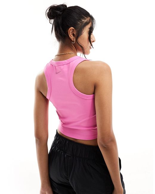 Nike - one training - débardeur moulant en tissu dri-fit - pastel Nike en coloris Pink