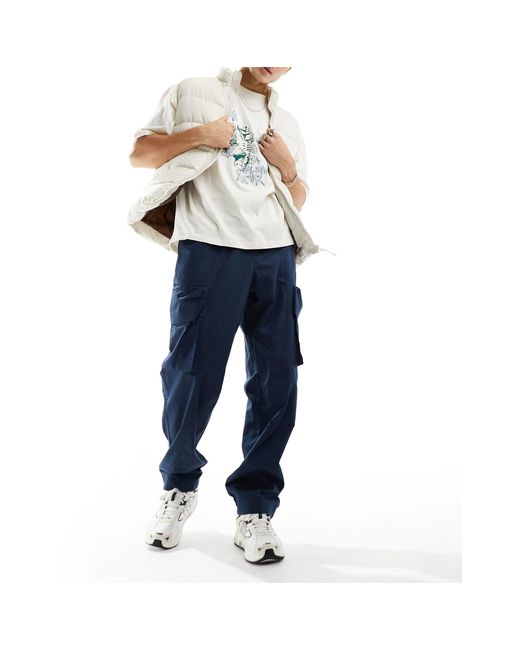 Pantalones cargo holgados con cinturilla elástica ASOS de hombre de color Blue