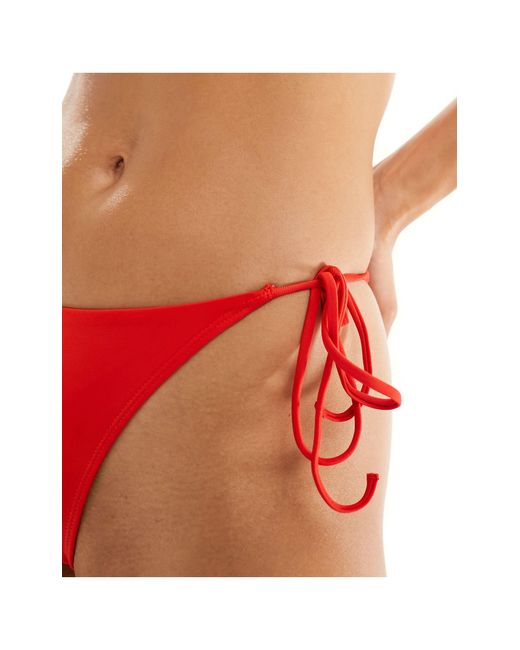 Mix and match - slip bikini rossi con allacciatura laterale di Monki in Red