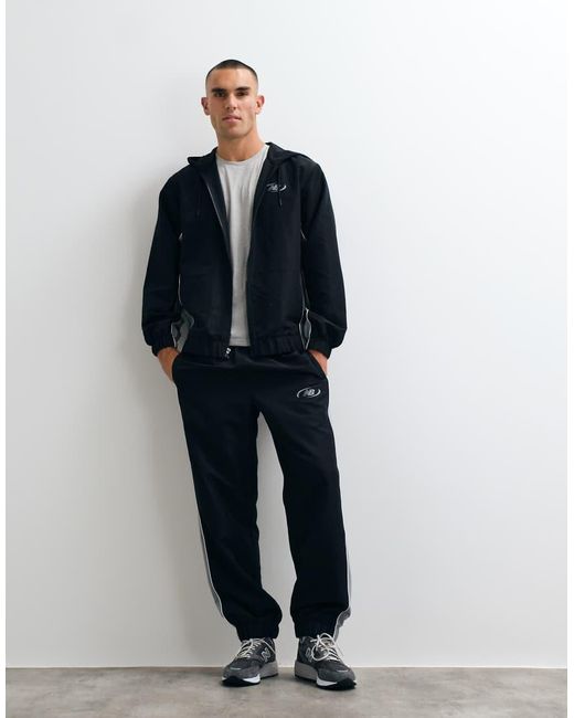 New Balance Gray Trackside Woven Pant for men