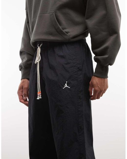 Nike Gray Brookyln Woven Trousers for men