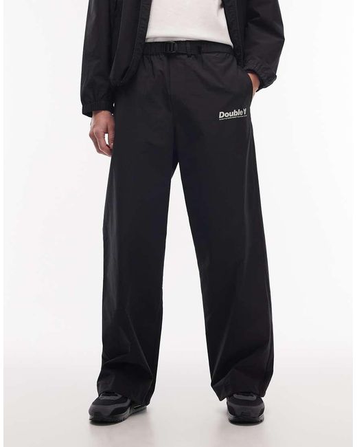 DOUBLE A by WOOD WOOD Black Robert Logo Shell Tracksuit Trousers Co-ord for men