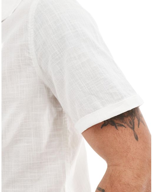 Camicia vestibilità classica effetto lino bianca con maniche con risvolto e colletto con rever di ASOS in White da Uomo