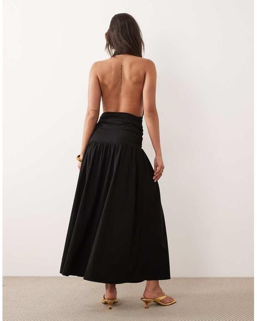 The Frolic Black Exclusive Plunge Halterneck Shirred Detail Low Back Thigh Split Maxi Dress