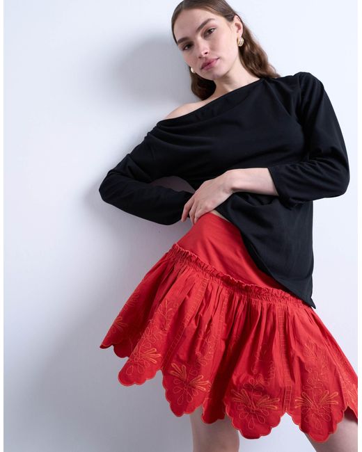 Mini-jupe à motifs ajourés et bords festonnés TOPSHOP en coloris Red