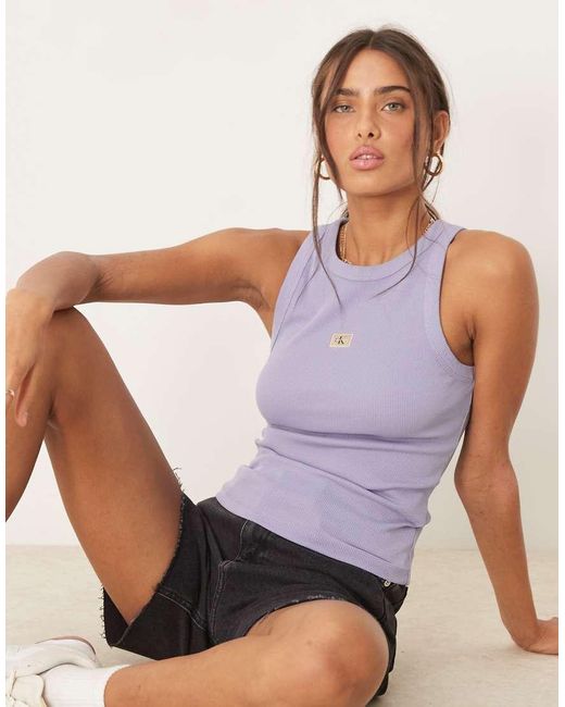 Calvin Klein Geribbelde Tanktop Met Geweven Label in het Purple