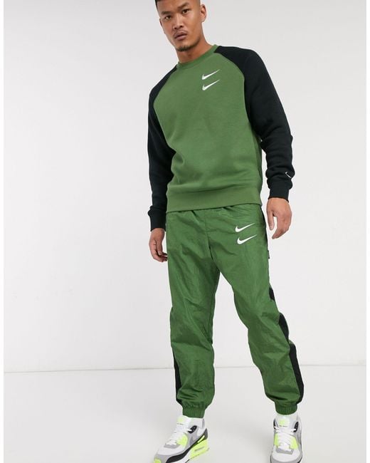 Nike Double Swoosh Joggers in Green for Men