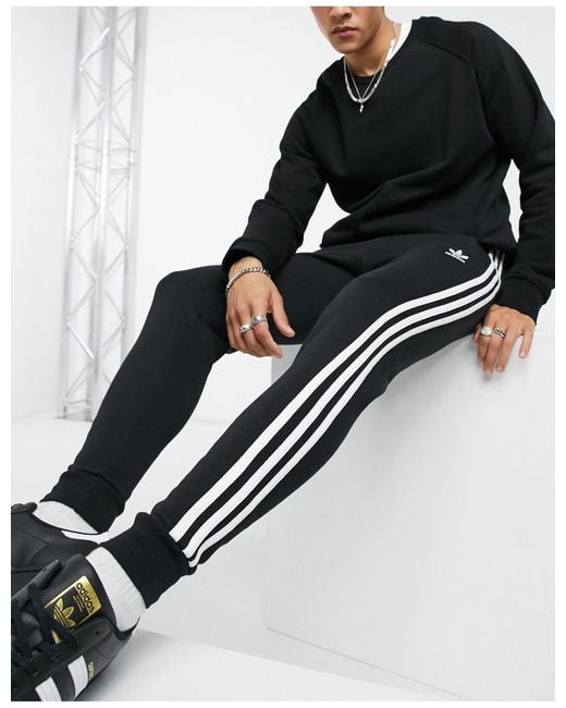 adidas Originals – adicolor – eng geschnittene jogginghose mit den drei  streifen in Schwarz für Herren - Sparen Sie 25% | Lyst AT