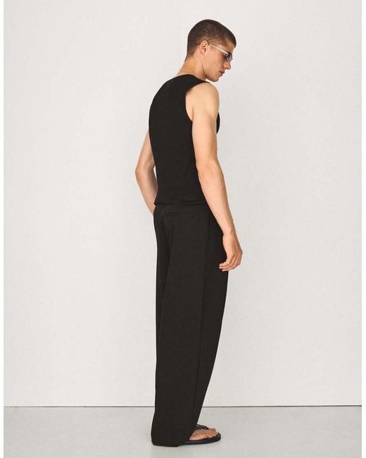 Bershka Black Pleated Baggy Trousers for men