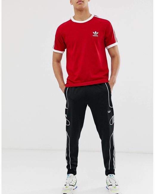 Adidas Originals – Flamestrike – Jogginghose mit fließendem 3-Streifendesign in Black für Herren