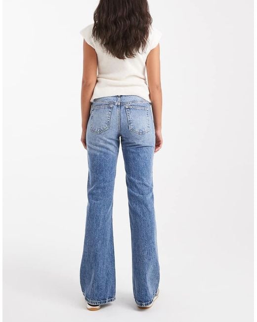 Vaqueros De Campana Azules De Talle Medio Con Lavado Medio De ASOS de color Blue