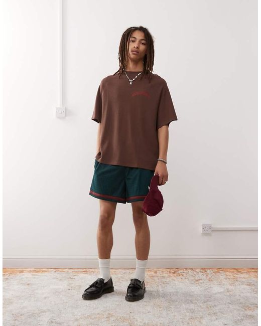 T-Shirt Oversize Con Stampa Grande Del Logo Sul Retro di Collusion in Red da Uomo