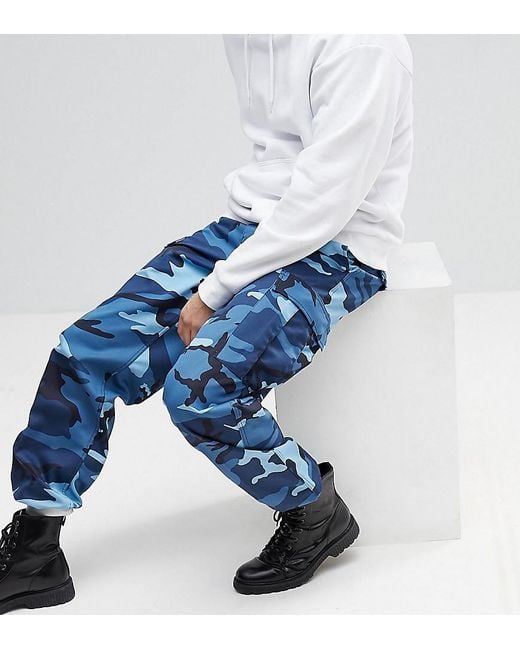 Reclaimed (vintage) Revived Camo Cargo Trousers In Blue for men