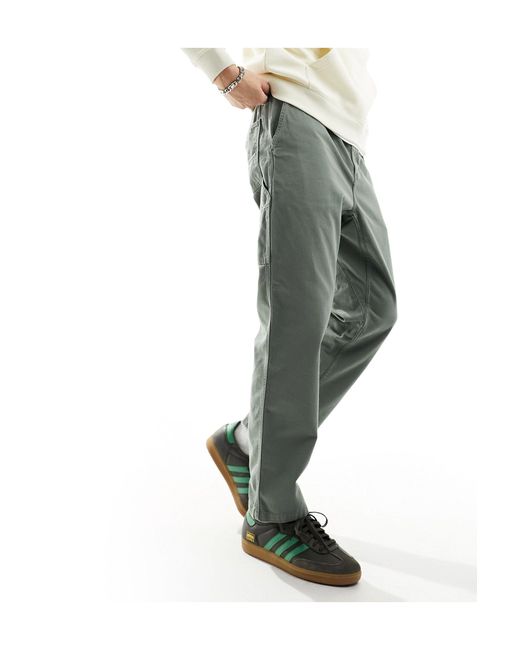 Flint - pantalon fuselé classique Carhartt pour homme en coloris Green
