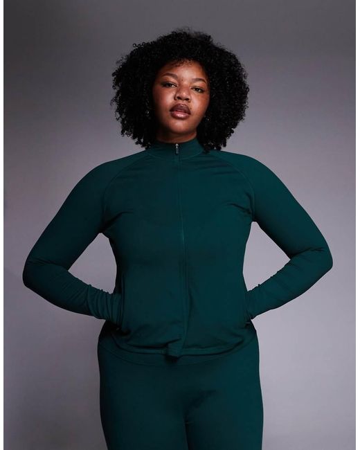 4505 Blue Curve Icon Zip Up Studio Long Sleeve Top