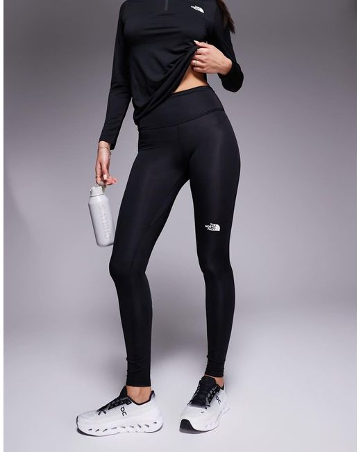 Leggings Capri Deportivos Negros Con Logo Flex De Training The North Face de color Blue