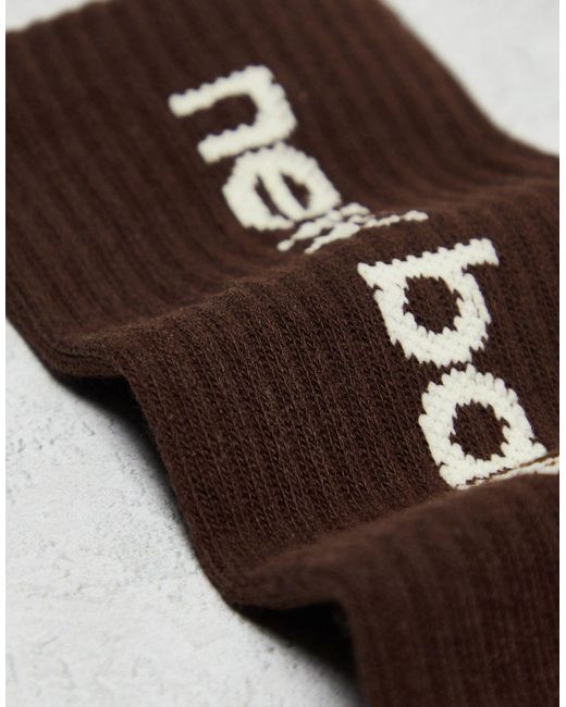 Confezione da 3 paia di calzini corti nero, marrone e bianco con logo lineare di New Balance in White da Uomo
