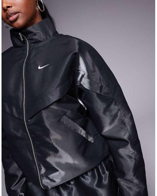 Nike Windrunner Liquid Shine in het Blue