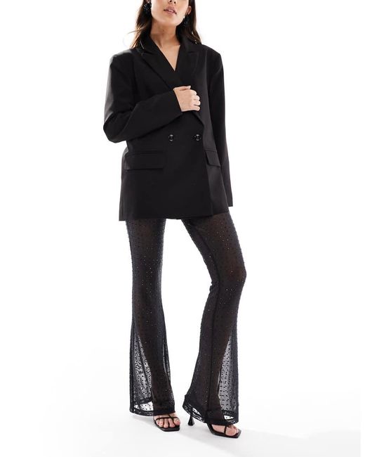 Pantalones De Campana Negros Con Diseño Termosellado De Malla De ASOS de color Black