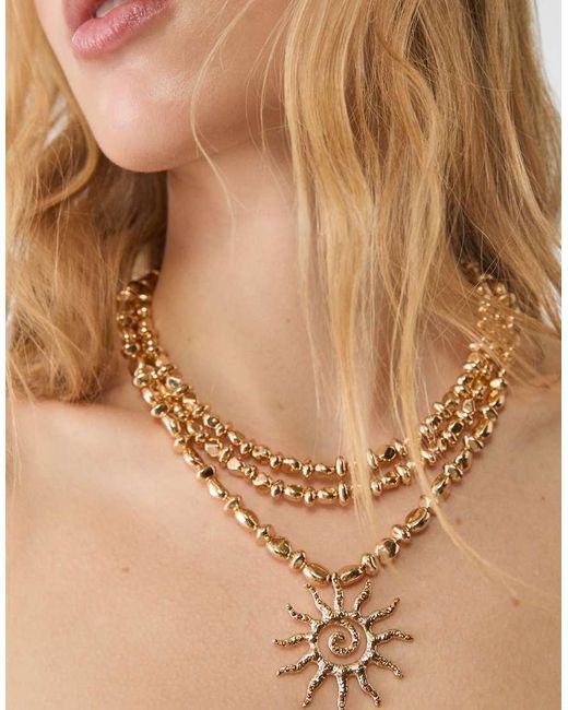 Stradivarius Lange Ketting Met Zon in het Natural