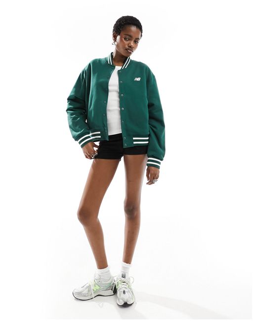 Sportswear greatest hits - giacca bomber stile college di New Balance in Green