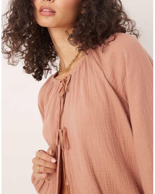 Top A Maniche Lunghe Allacciato Sul Davanti Da Spiaggia Color Ruggine di Iisla & Bird in Brown