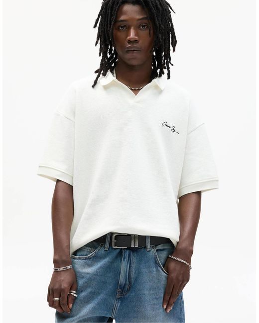 Polo en maille à slogan brodé - cassé Pull&Bear pour homme en coloris Blue