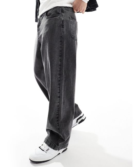 Jeans super ampi slavato di ADPT in Black da Uomo