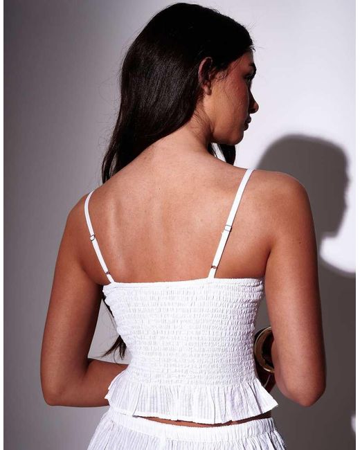 South Beach White Seersucker Smocked Peplum Top