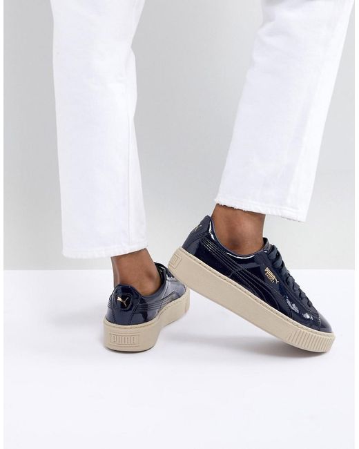 navy patent trainers