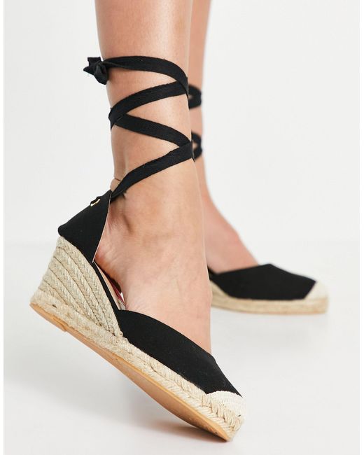 zeppe nere con lacci