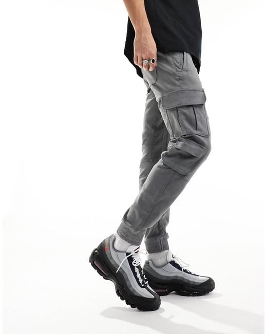 Pantalon cargo a poches contrastantes Bershka pour homme en coloris Noir Lyst