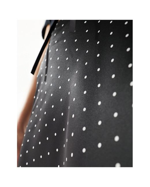 Monki Black Satin A-line Midi Skirt With Front Bow Detail