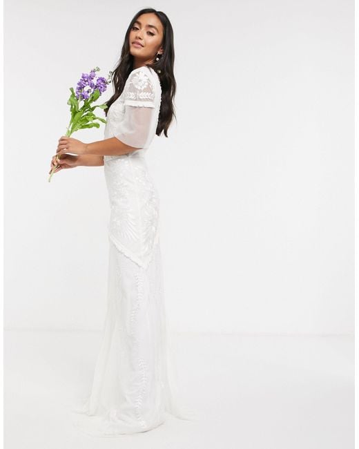 Frock and Frill White Bridal Maxi Dress With Embellishment And Frill Detail