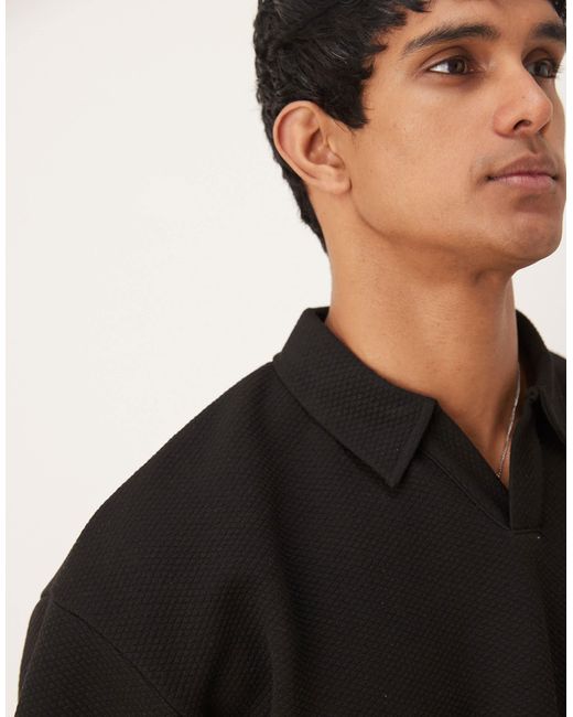 ASOS – oversize-polohemd aus schwerem, strukturiertem material in Black für Herren
