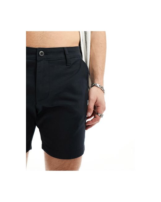 Pantalones cortos chinos ajustados en ASOS de hombre de color Black