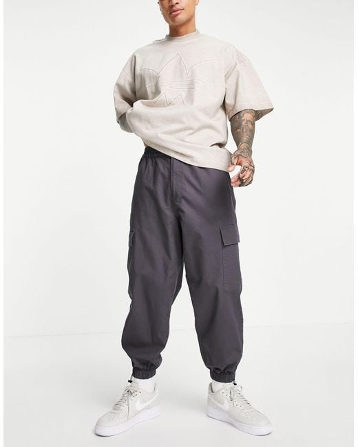 ASOS Oversized Tapered Cargo Trousers With toggle Hem in Grey for Men |  Lyst Canada