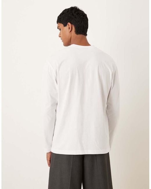 T-Shirt Comoda A Maniche Lunghe Bianca Con Stampa Di Stemma Sul Petto di ASOS in White da Uomo