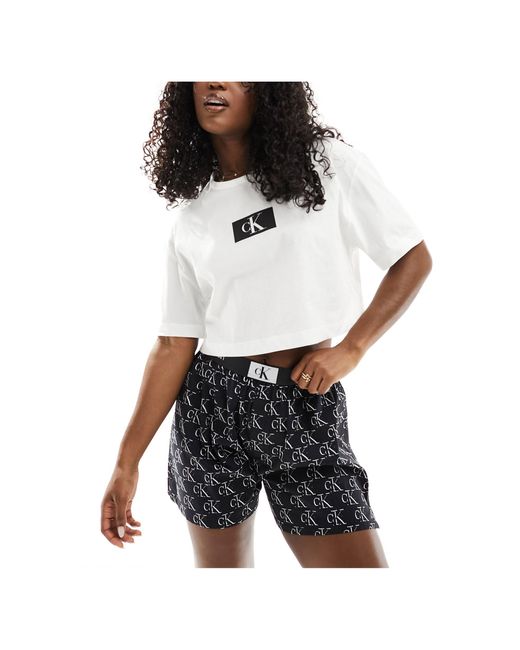 Calvin Klein Multicolor – ck 96 – pyjama-set aus shorts und hemd aus gewebter baumwolle mit schwarz-weißem logodruck
