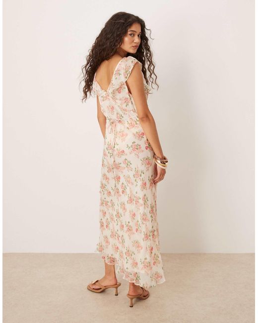 Robe longueur mollet à volants et col v - imprimé fleurs Mango en coloris Natural