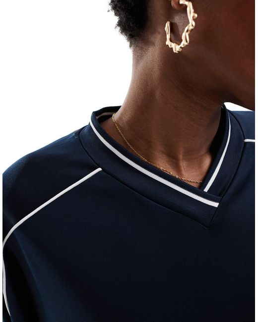 Sweat d'ensemble oversize à col v en jersey brillant avec bord contrastant - /blanc Weekday en coloris Blue