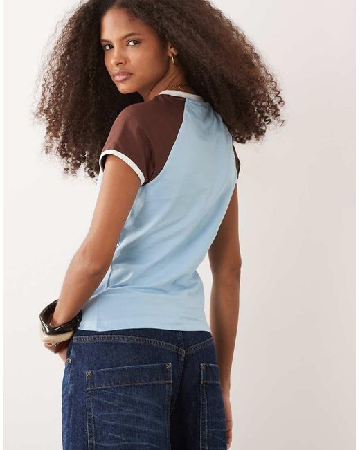 ASOS Blue Contrast Raglan Sleeve T-shirt With Highly Favoured Graphic